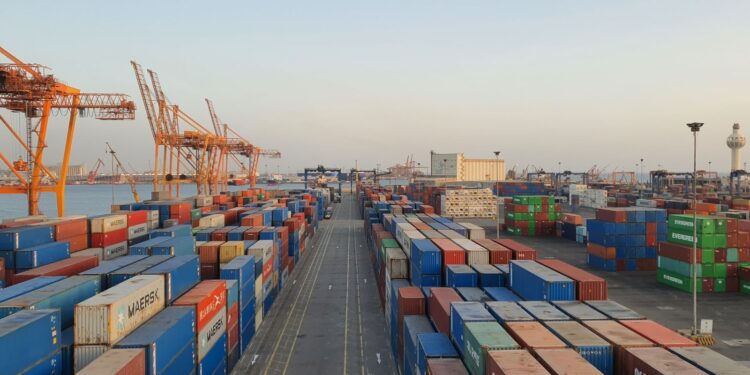 Colorful cargo containers at a harbor at sunrise, like the app bundles you use when you install Docker on Ubuntu