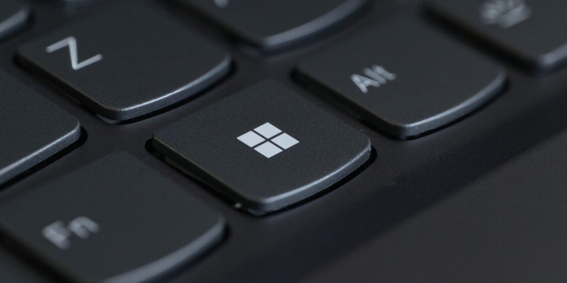 Laptop keyboard with the Windows logo key in focus and nearby keys blurred, for Patch Tuesday October 2026.