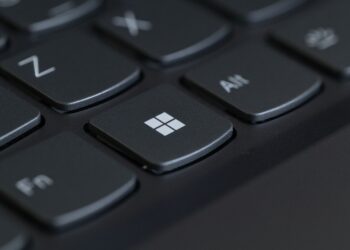 Laptop keyboard with the Windows logo key in focus and nearby keys blurred, for Patch Tuesday October 2026.