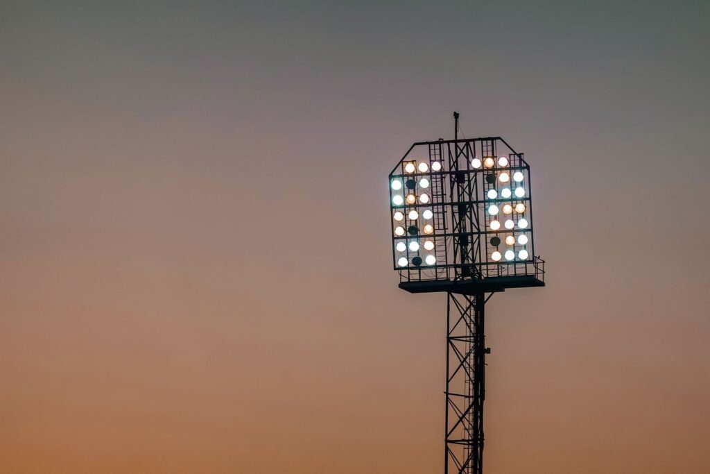 Stadium floodlights at dusk, a cue to save the Rugby League World Cup 2026 final date