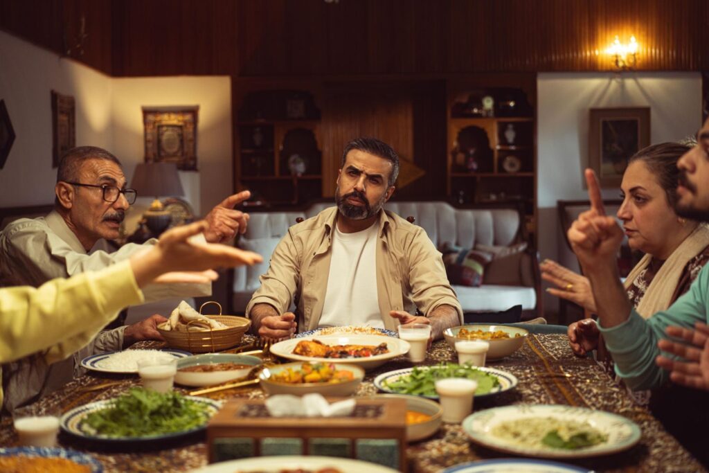 Family talking around a dinner table